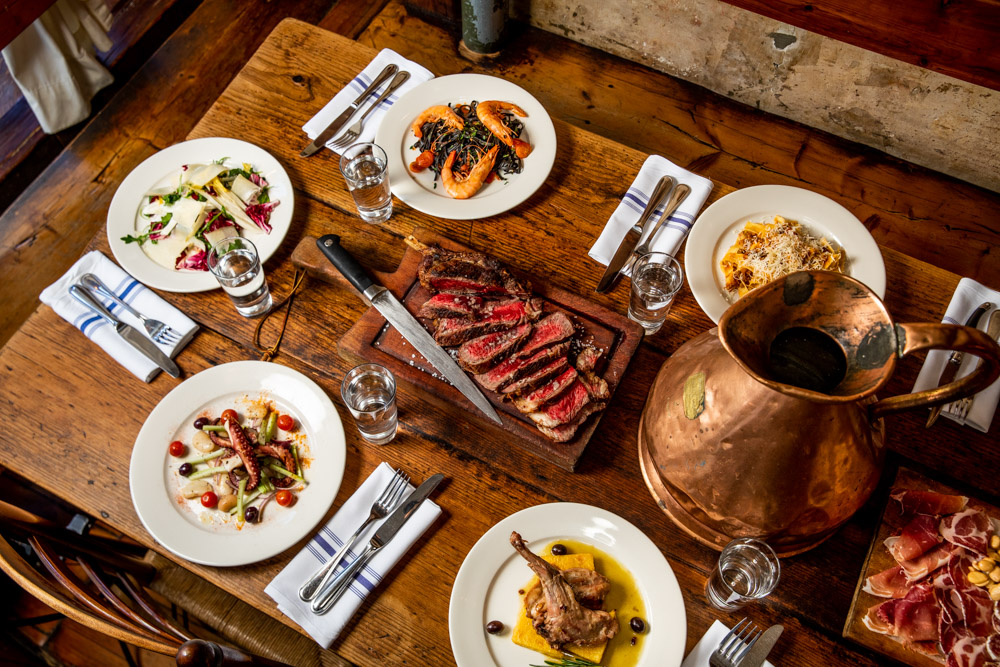 A spread of rustic Italian food at Convivium Osteria in Park Slope